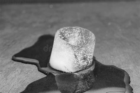 The Process Of Melting An Ice Cube Black And White Stock Image Image