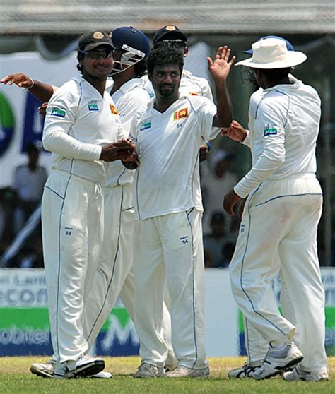 Muttiah Muralitharan Celebrates The Wicket Of Jesse Ryder