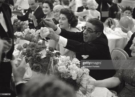 The Greek Shipowner Aristotle Onassis Makes To Light A Cigar To The News Photo Getty Images