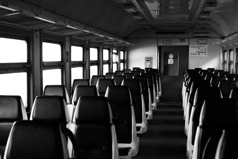 Grayscale Photography of Train Car Interior · Free Stock Photo