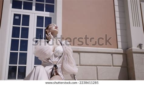 Beautiful Model White Lingerie Cape Action Stock Photo