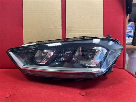 LAMPA LEWA LEWY BI XENON VW SPORTSVAN 517941031B 517941031B LAMPA LEWA