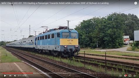 MÁV Class V43 431 195 Hauling a Passenger Towards Keleti while a Airbus ...