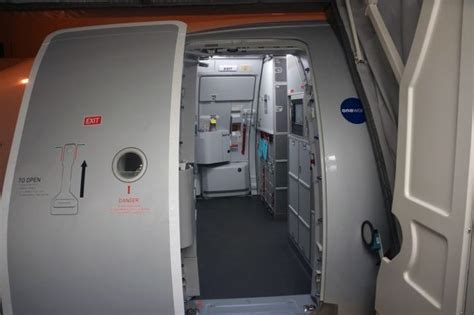 Boarding L1 Door Americans A321 Inaugural Flight 2014 Locker