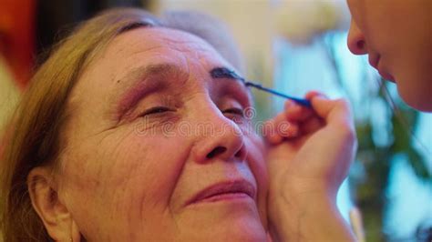 Granddaughter Applies Eyebrow Tint To Make Her Granny More Beautiful