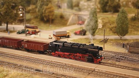 A pretty nice model railway in HO scale with smoking steam locomotives