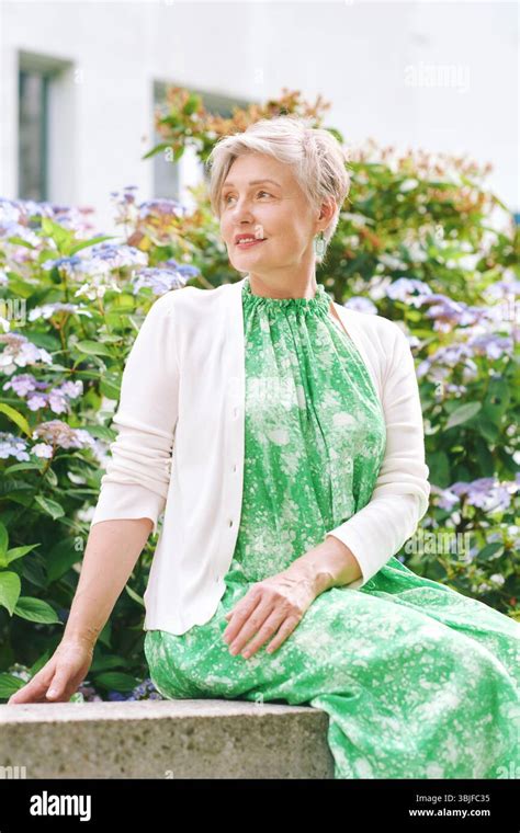 Outdoor Portrait Of Beautiful Mature Woman Of Year Old Nice