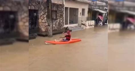 Homem Usa Canoa Para Se Locomover Em Alagamento No Recife Banda B