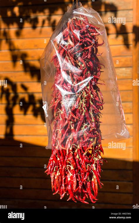 Bundles Of Red Chili Peppers Dry In The Sun Stock Photo Alamy