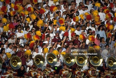 USC fans with pom poms and marching band during game vs UCLA, Los ...