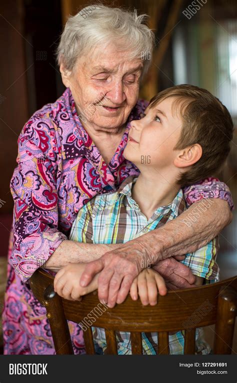 Grandmother Hugging Image And Photo Free Trial Bigstock