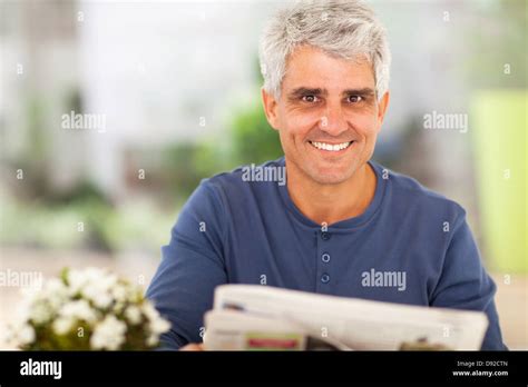 Happy Smiling Newspaper Reading Hi Res Stock Photography And Images Alamy