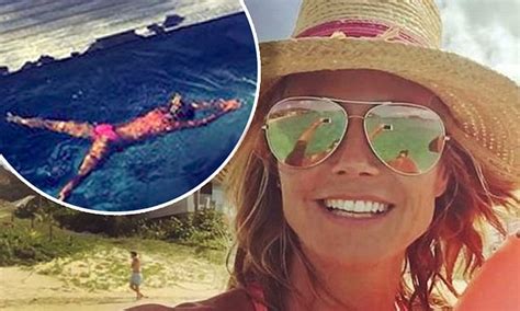 Heidi Klum Briefly Suspends Her Tropical Vacation To Test Drive Her Latest Tiny Bikini Daily