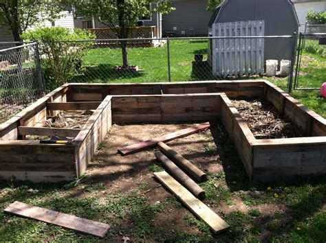 Raised garden bed made from pallets | Raised garden beds, Raised garden ...