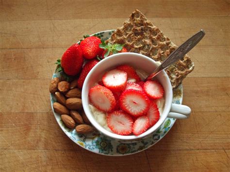 almond dessert tofu with sliced strawberries,... | Garden of Vegan