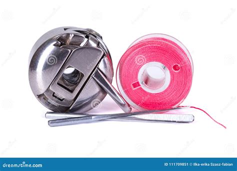 Bobbin Case Beneath The Sewing Machine Royalty Free Stock Image