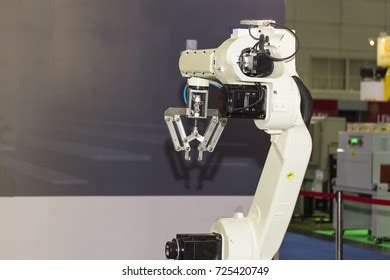 High Technology Precision Robot Arm Grip Stock Photo 725420749