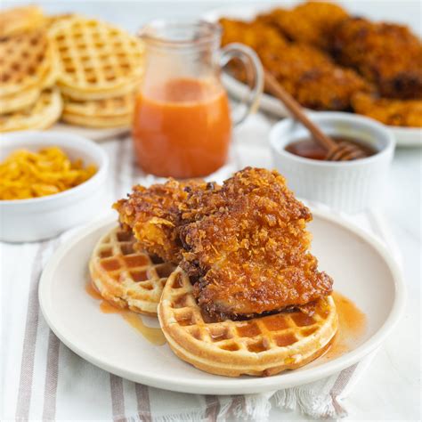 Corn Flake Crusted Fried Chicken With Waffles Hot Honey Sauce And Maple Syrup Shaws