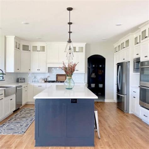 Arched Doorway Leads To White Kitchen Soul Lane