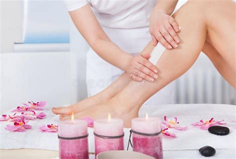 Beautician Waxing Woman S Leg Stock Photo Image Of Flower Epilation