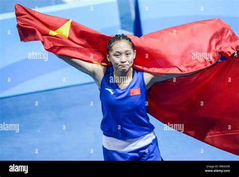 Chang Yuan Of China Waves The Chinese National Flag After Winning