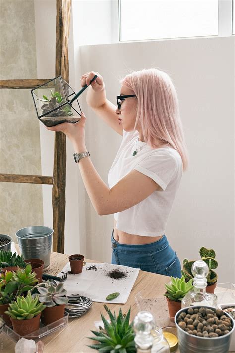 Side View Of Blonde Woman Working With Succulents By Stocksy Contributor Danil Nevsky Stocksy