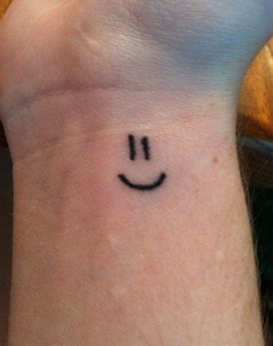 Show Off Your Fun Side With These Smiley Tattoos