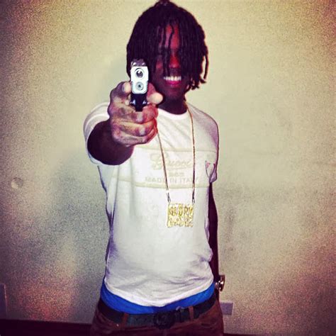 Chief Keef Holding A Rifle At A Gun Range