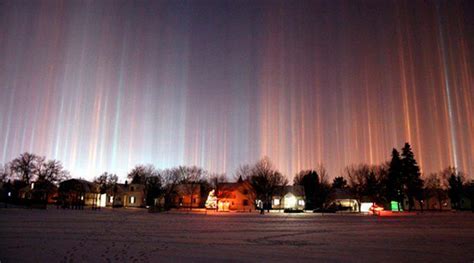 Magical Light Pillar Phenomenon Photographed Across Russian Skies