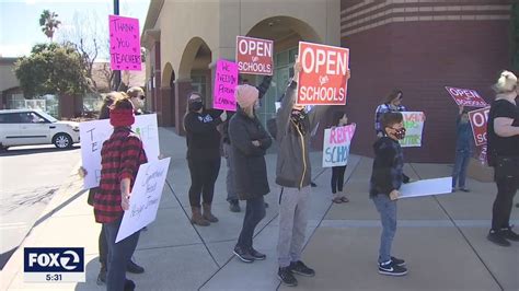 Oakley parents hold protest to reopen schools after viral hot mic ...