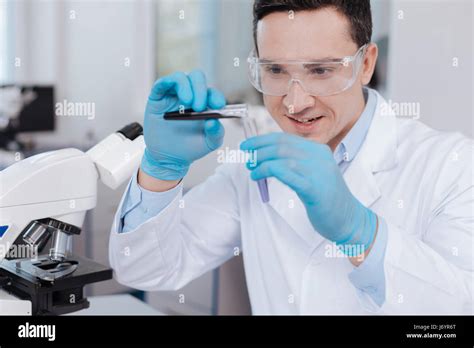 Positive Delighted Brunette Doing Experiment Stock Photo Alamy