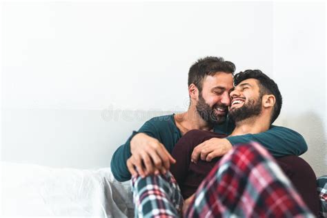 Happy Gay Couple Having Tender Moments In Bedroom Stock Image Image