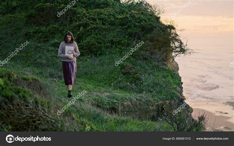 Girl Walking Off Cliff