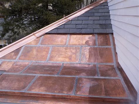 New Flat Seam Copper Roof With Hip And High Hat Triple M Contracting