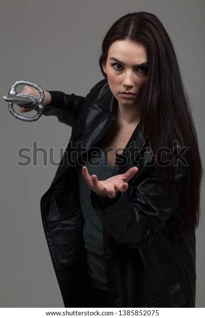 Attractive Caucasian Brunette Wearing Leather Jacket Stock Photo