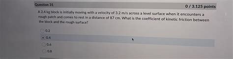 Solved A 2.4 kg block is initially moving with a velocity of | Chegg.com