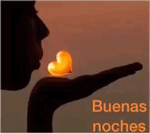 A Person Holding A Flower In Their Hand With The Words Buenas Noches On It