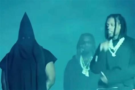 Kanye West Wears a Black KKK-Inspired Hood at Album Listening - XXL