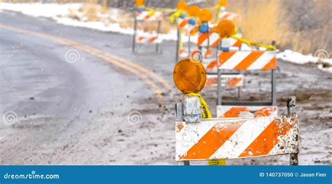 Row of Traffic Barricades on the Side of the Road Stock Photo - Image ...