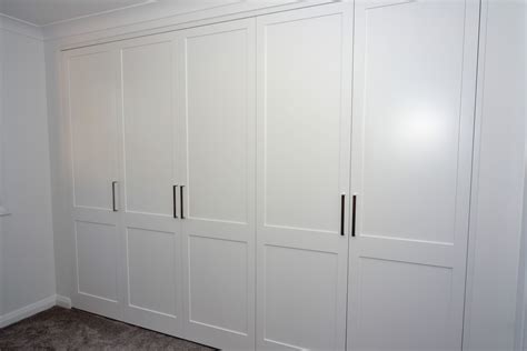 Luxurious White Solid Hardwood Built In Wardrobe With Simple Models As