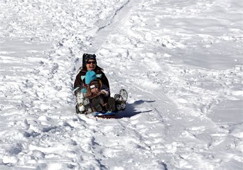 Mother And Children Having Fun On The Sled Hill Stock Photo Image Of