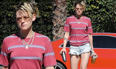 Kristen Stewart Bares Her Tanned Legs In Cut Off Denim Shorts While On