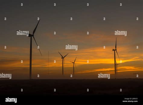 Silhouettes Of Wind Turbines At Dawn Near Hopefield A Town In The Western Cape Province Stock