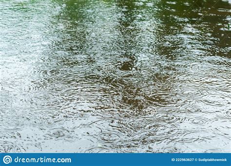 Raindrops Falling On Water Rain Drops On Water Surface Abstract