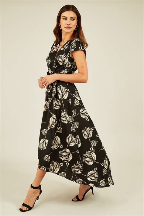 Mela Black Rose Print Dipped Hem Wrap Dress Mela