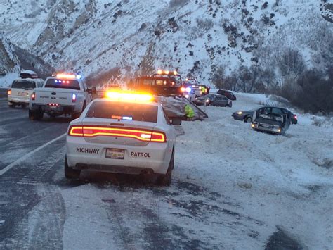 Road Conditions: Winds, ice lead to pile ups, semi restrictions, road