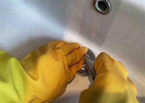 how to fix sink plug