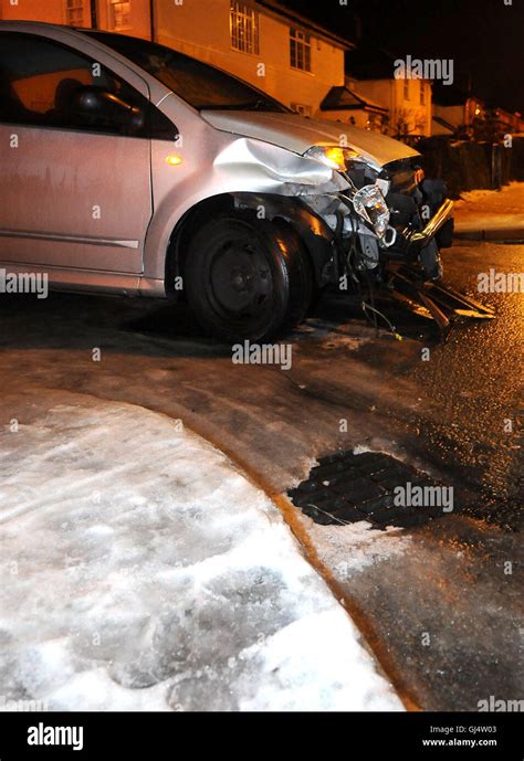 A Car Accident Involving Black Ice At Night Stock Photo Alamy