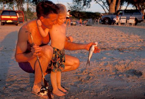 Father And Son Fishing Joel Sartore