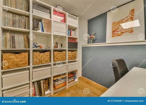 A Home Office with a Large Bookshelf Filled Editorial Photography ...